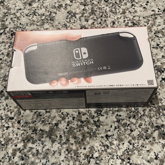 Nintendo Switch Lite in Gray - Picture 3 of 3
